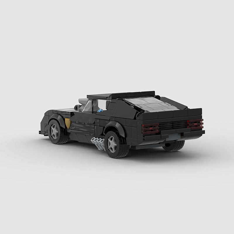 Detailed image of the RevvBlox 1973 Ford Falco Mad Max V8 Interceptor model showing the rugged design and iconic vehicle details.