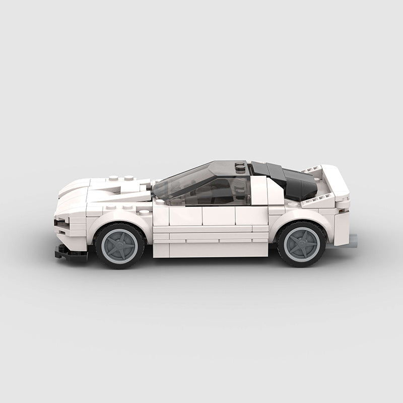 Red Mazda RX-7 FC3C RevvBlox model car with detailed exterior and sleek design, showcasing the classic sports car shape.