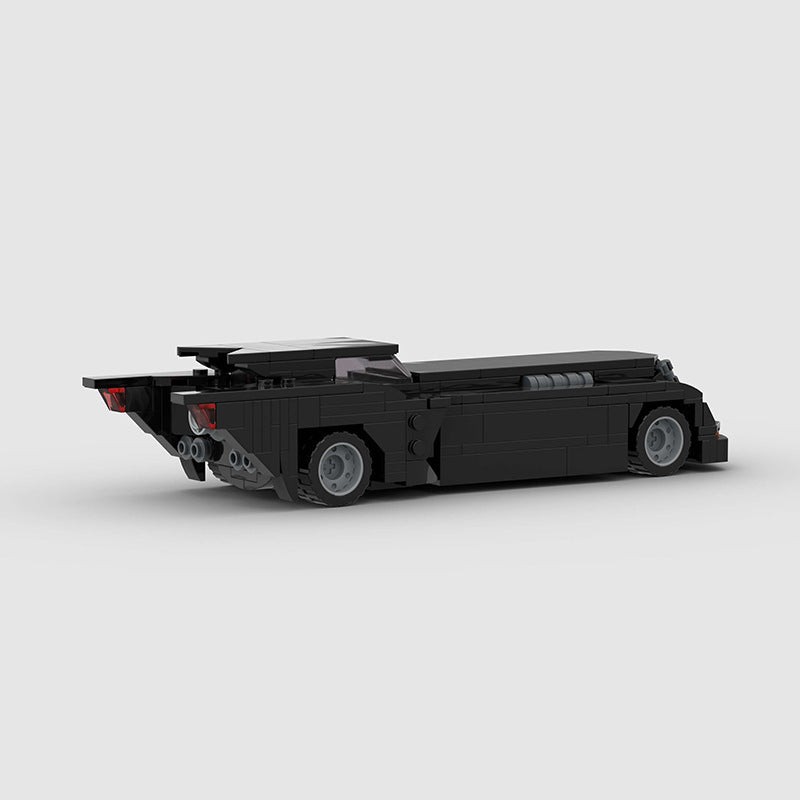 RevvBlox Batmobile toy model with detailed black and gray design, featuring sleek Batmobile features and realistic vehicle details.