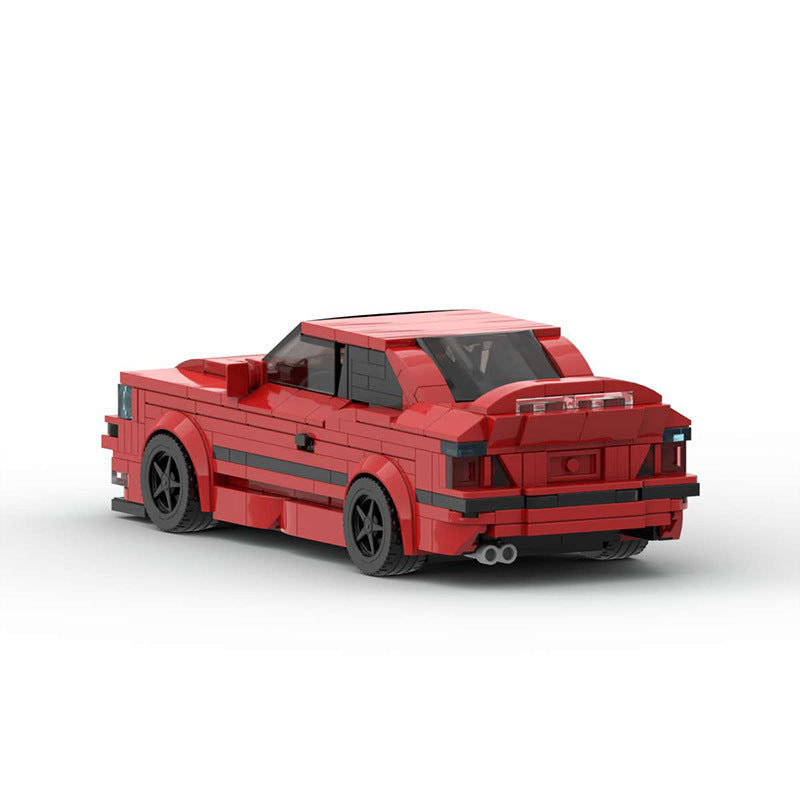 RevvBlox BMW M3 E36 model car in blue, detailed plastic replica with realistic features and accurate design.