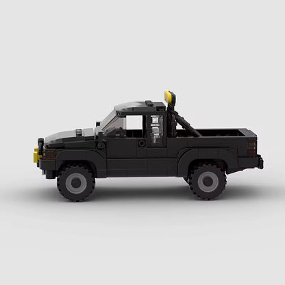 RevvBlox Toyota SR5 truck model with detailed exterior design and realistic features, shown from a side angle.
