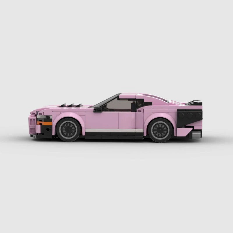 Pink Ford Mustang Shelby GT500 model by RevvBlox, showcasing detailed exterior design and iconic car features.