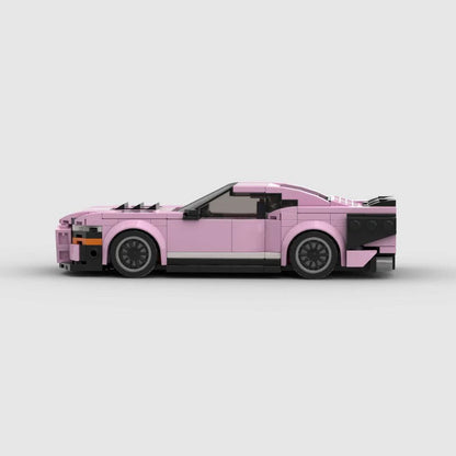 Pink Ford Mustang Shelby GT500 model by RevvBlox, showcasing detailed exterior design and iconic car features.