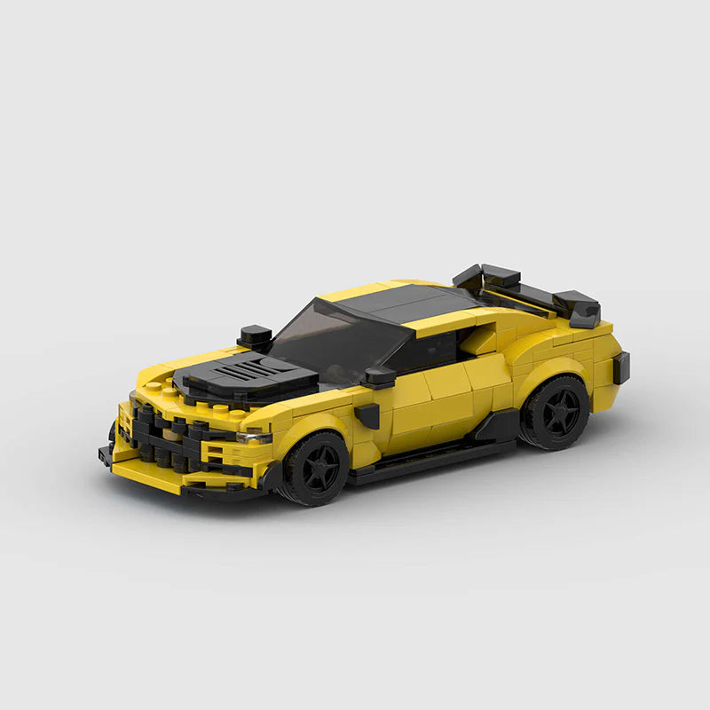RevvBlox Chevrolet Camaro Bumblebee toy from Transformers, detailed model with yellow and black design, showcasing the car's features.