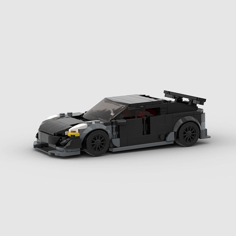 RevvBlox Tesla Model 3 Bionic toy car model with detailed exterior and sleek design, showcasing the miniature electric vehicle.