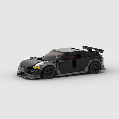 RevvBlox Tesla Model 3 Bionic toy car model with detailed exterior and sleek design, showcasing the miniature electric vehicle.