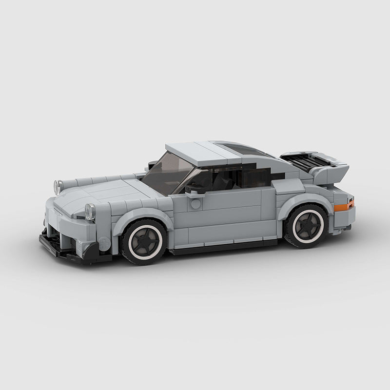 Porsche 911 RWB model by RevvBlox showcasing sleek lines and detailed bodywork in vibrant colors.