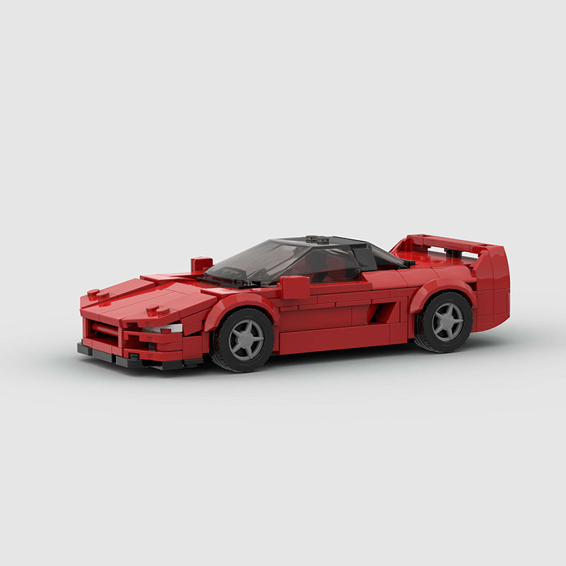 RevvBlox Honda Acura NSX NA-1 model car in red, detailed plastic die-cast replica with realistic features and branding.