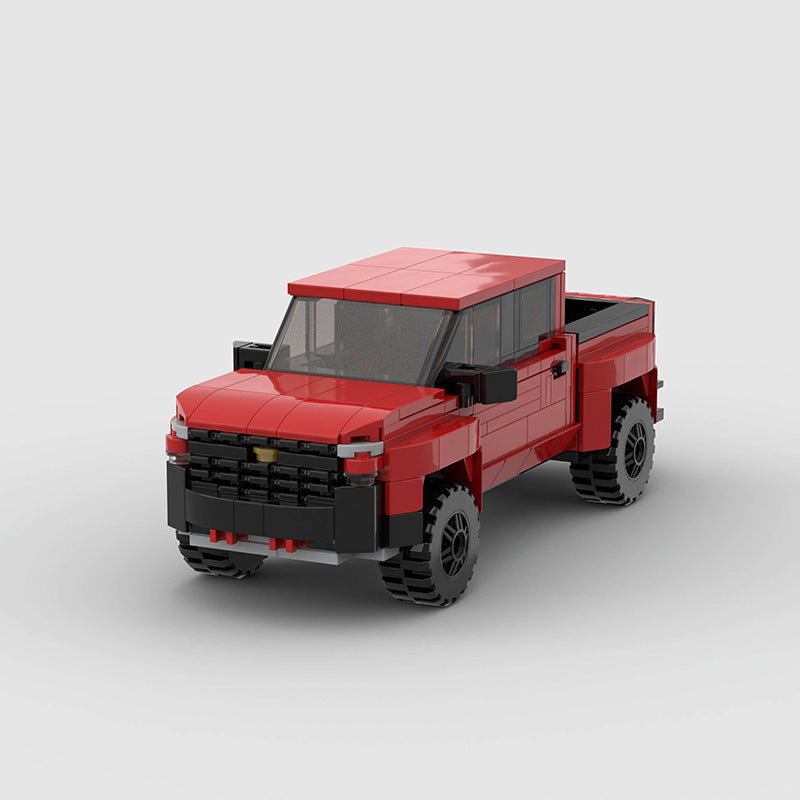 RevvBlox Chevrolet Silverado toy truck with detailed blue and gray plastic construction and realistic design features.