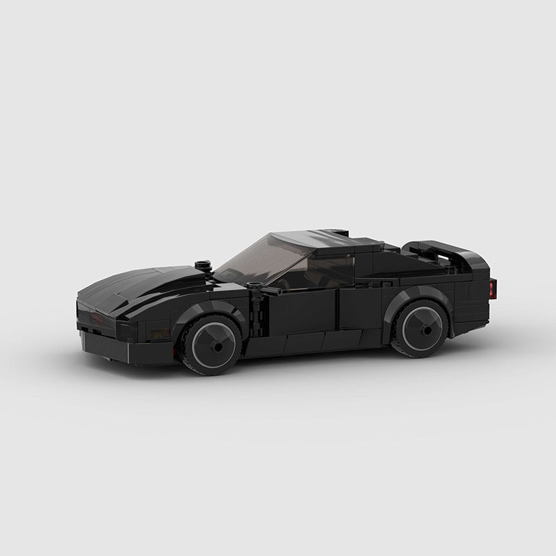 RevBlox Night Rider toy car with sleek black design and detailed interior, ideal for display or play.