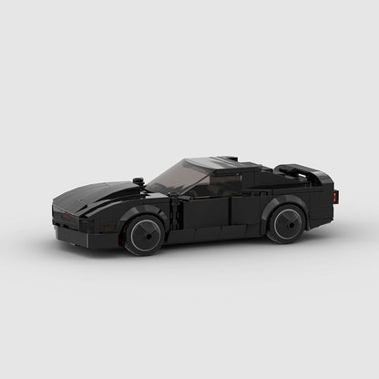 RevBlox Night Rider toy car with sleek black design and detailed interior, ideal for display or play.