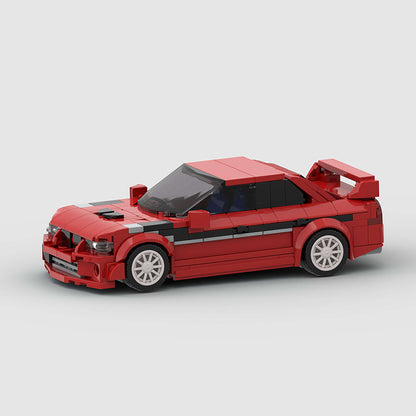 RevVBlox Mitsubishi Lancer EVO toy car model with detailed red and black design, realistic features, and sleek exterior.