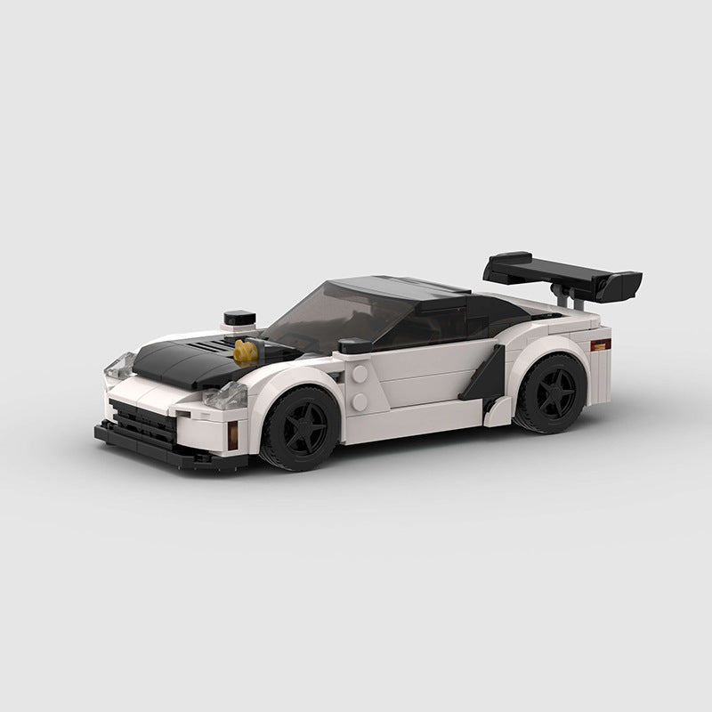 RevVblox Mitsubishi GTO 3000GT model car in vibrant red with detailed exterior and realistic features.