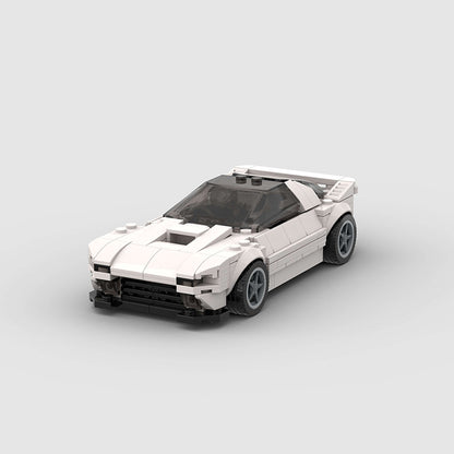 RevVBlox Mazda RX-7 FC3C model car with detailed exterior and vibrant paint, showcasing classic sports car design.