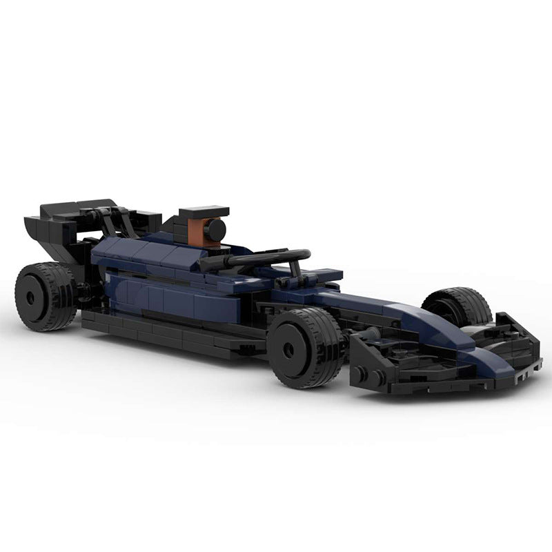 Black and dark blue LEGO model of a Formula 1 race car with rear wing and detailed tires