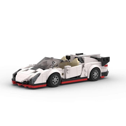 White sports car model built with LEGO bricks featuring black and red accents and an open roof