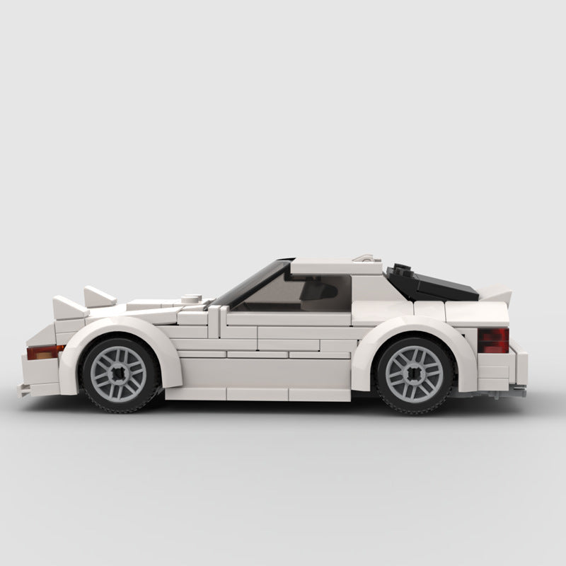 RevVBlox Mazda RX-7 FC model car with detailed blue exterior and aerodynamic design, showcasing a realistic die-cast replica.