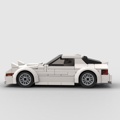 RevVBlox Mazda RX-7 FC model car with detailed blue exterior and aerodynamic design, showcasing a realistic die-cast replica.