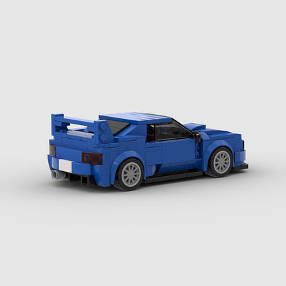 RevvBlox Subaru Impreza diecast model car, detailed blue and silver miniature vehicle with realistic features and branding.