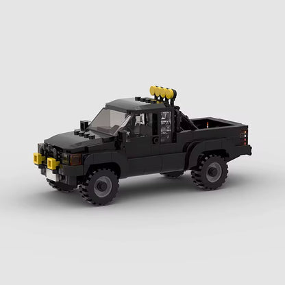 RevVBlox Toyota SR5 truck model featuring detailed exterior with blue and black accents, showcasing realistic design and sturdy construction.