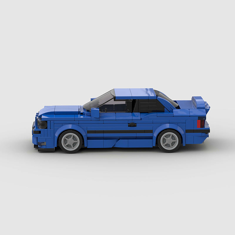 RevvBlox BMW M3 E36 model car in detailed blue and black with realistic design and intricate features.