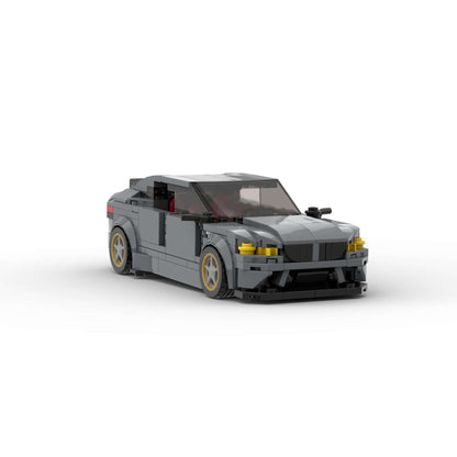 RevBlox BMW M5 CS model car in detailed black and silver, showcasing intricate design and realistic features.