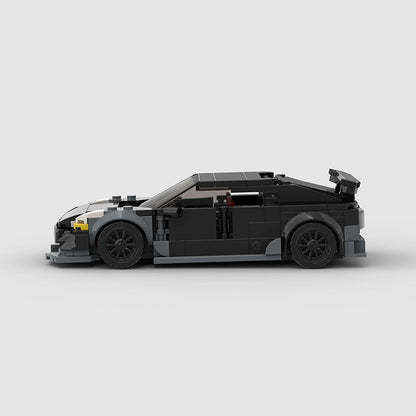 Revvblox Tesla Model 3 Bionic toy car with detailed design and vibrant colors, showcasing a miniature electric vehicle model.