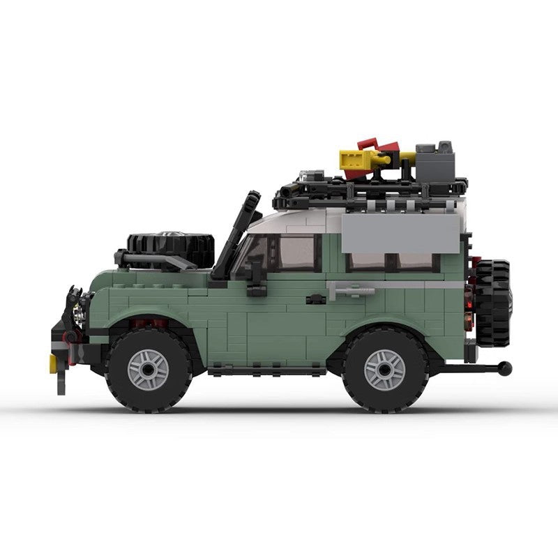 Green LEGO off-road SUV model with roof rack, spare tire on hood and rear, and detailed accessories