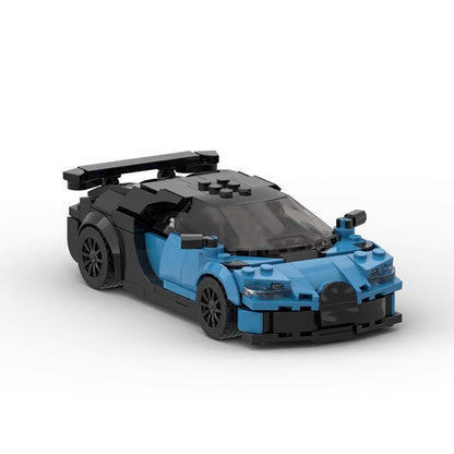 Blue and black LEGO sports car model with aerodynamic design and rear spoiler on white background