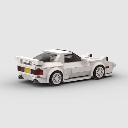 RevVBlox Mazda RX-7 FC3S scale model car with detailed red and white design and realistic features.