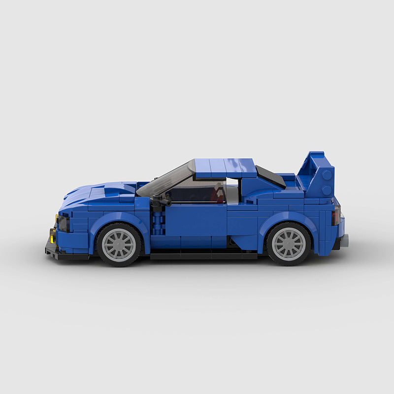 RevvBlox Subaru Impreza model car showcasing detailed design and vibrant red paint on a white background.
