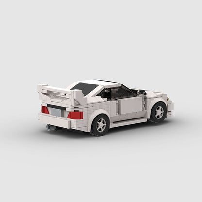 Revvblox Mitsubishi Lancer Evolution Gen V model car with detailed exterior and racing-inspired design.