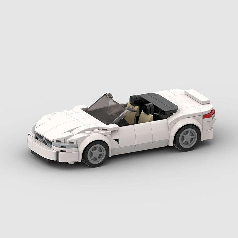 Revvblox BMW Z4 Roadster diecast model car, detailed black convertible with open top and realistic features.