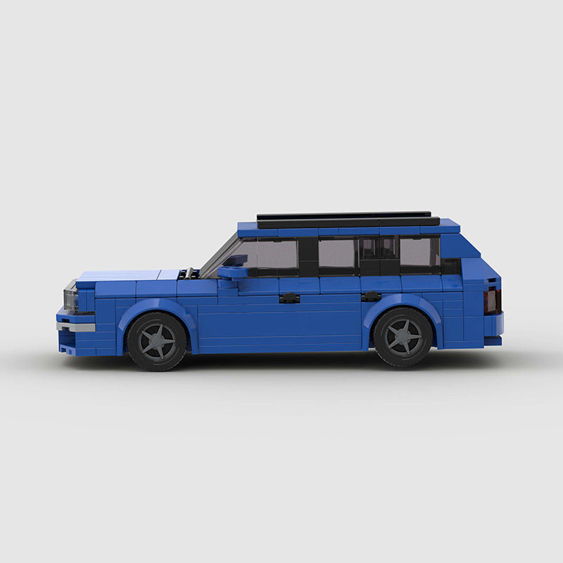 RevVBlox Audi RS2 model car in detailed plastic construction with red and black accents, showcasing realistic design and features.