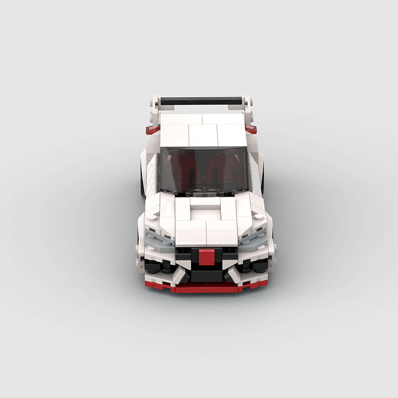 RevvBlox Honda Civic model car in blue with detailed exterior and realistic features, showcasing the compact sedan design.