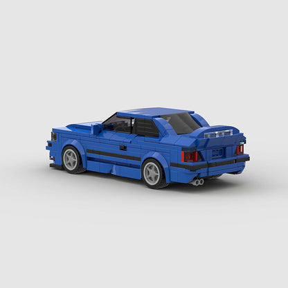 Revell RevvBlox BMW M3 E36 model car with detailed features, showcasing the classic sports car design and vibrant colors.