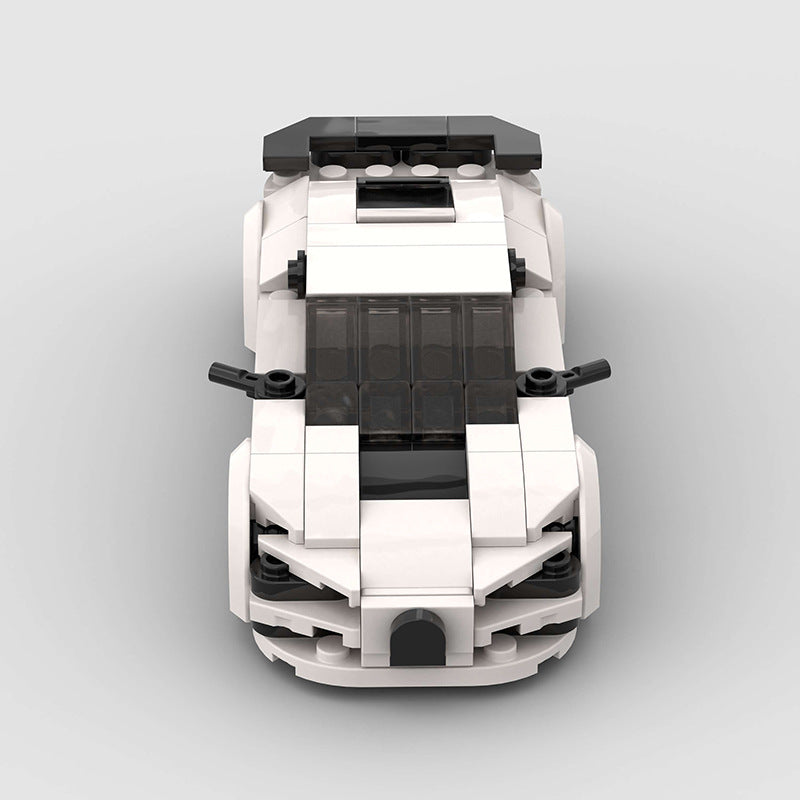 RevvBlox Bugatti Chiron model car with detailed black and orange design, showcasing the luxury sports car replica.