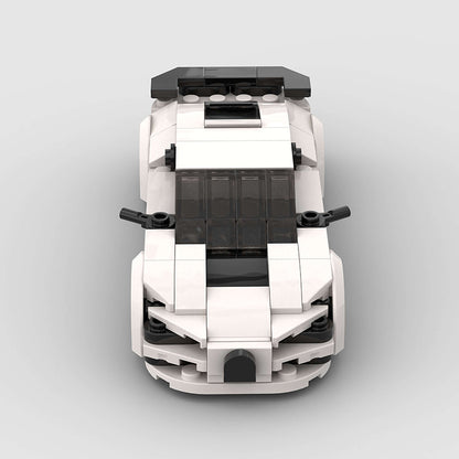 RevvBlox Bugatti Chiron model car with detailed black and orange design, showcasing the luxury sports car replica.