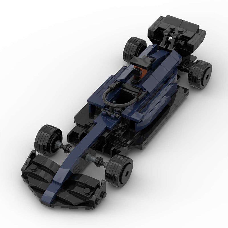 Black and dark blue LEGO Formula 1 race car model with detailed front wing and tires on white background
