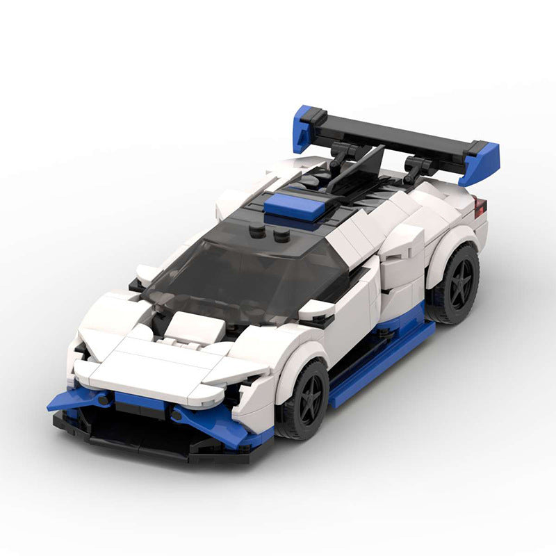 White and blue LEGO sports car model with black tinted windshield and rear spoiler