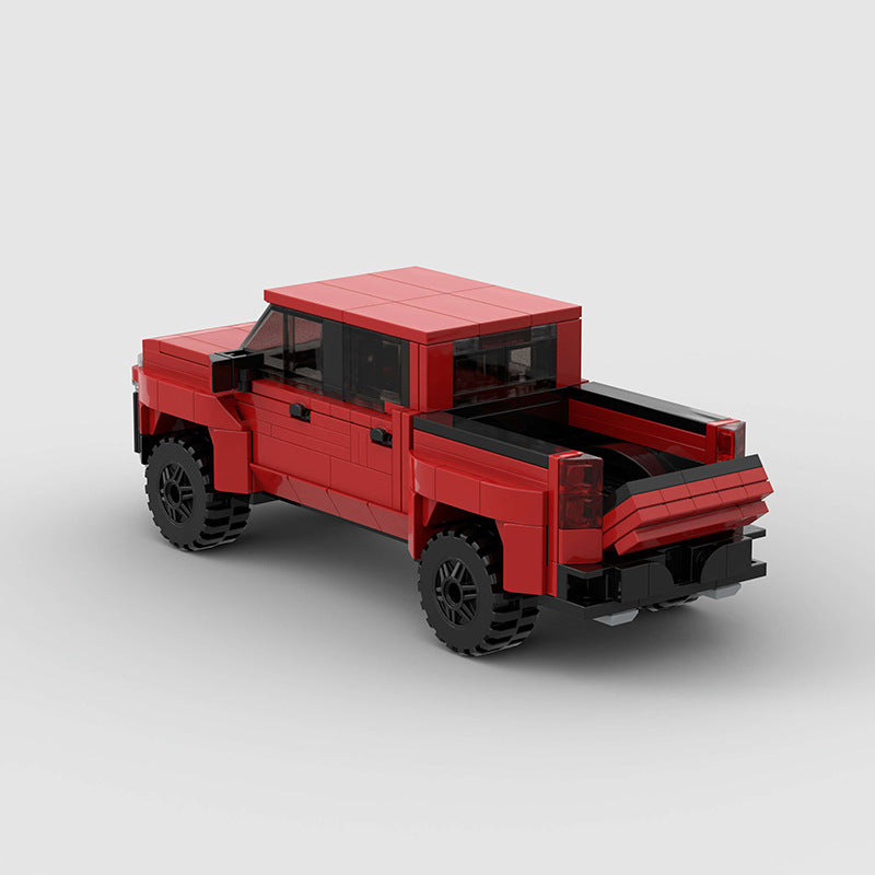 RevvBlox Chevrolet Silverado toy truck with detailed blue and silver design, showcasing realistic features and sturdy construction.