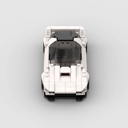 RevVBlox Mazda RX-7 FC3C diecast model car with detailed exterior and vibrant paint, showcasing classic sports car design.