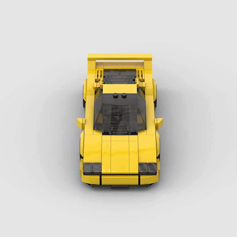 RevVBlox Ferrari F40 model car showcasing detailed red plastic construction and intricate design features.