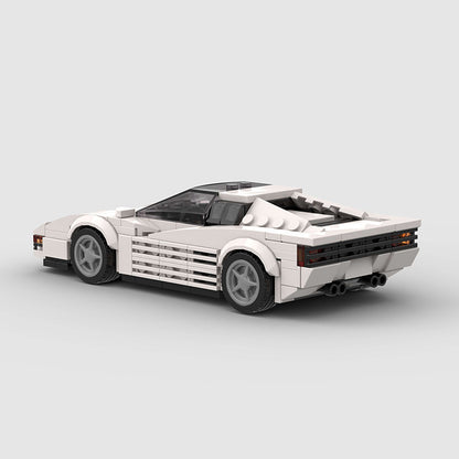 Red Ferrari Testarossa diecast model by RevvBlox showing detailed exterior and iconic side strakes.