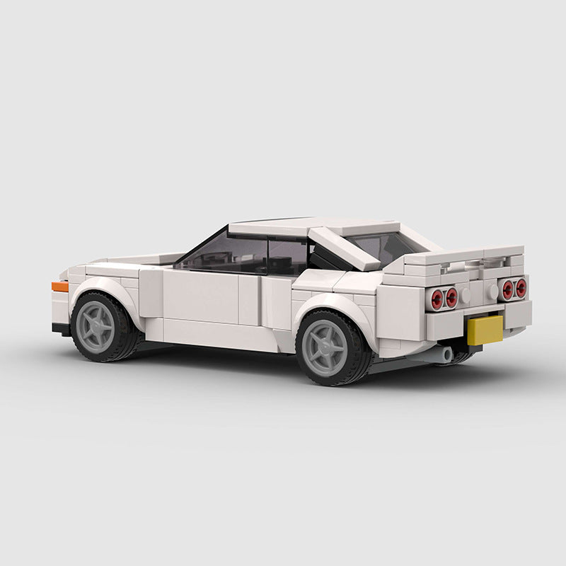 RevVBlox Honda Prelude 5th Gen diecast model car shown from a front-side angle with detailed features and vibrant paint.