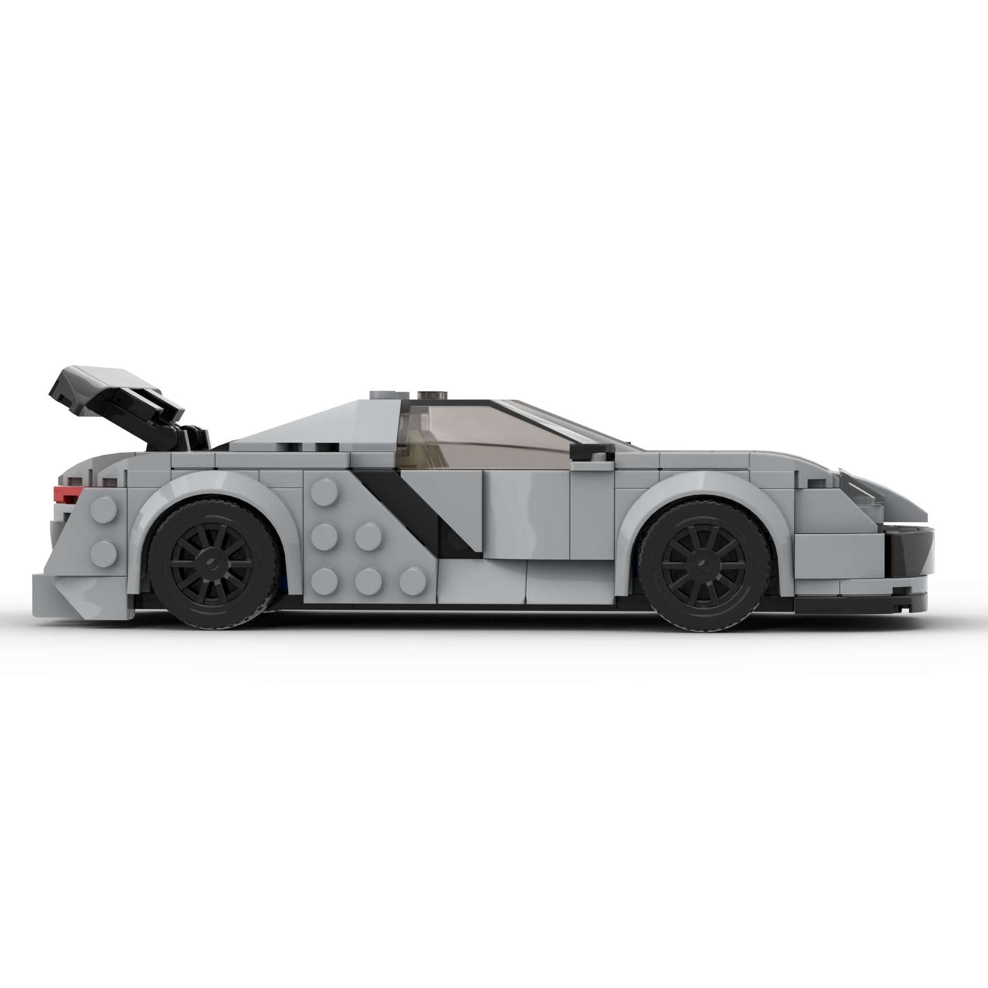 Detailed RevvBlox Porsche 918 Spyder model car with sleek design and vibrant colors, showcasing realistic features and branding.
