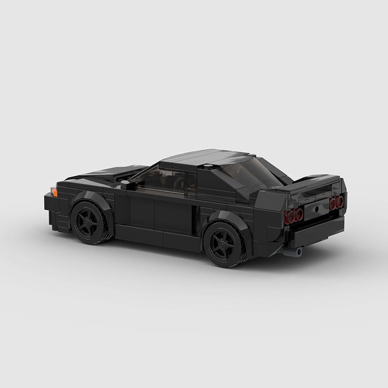 RevVblox Nissan Skyline GT-R R32 "Takeshi" model car from Initial D, detailed black and red sports car replica.
