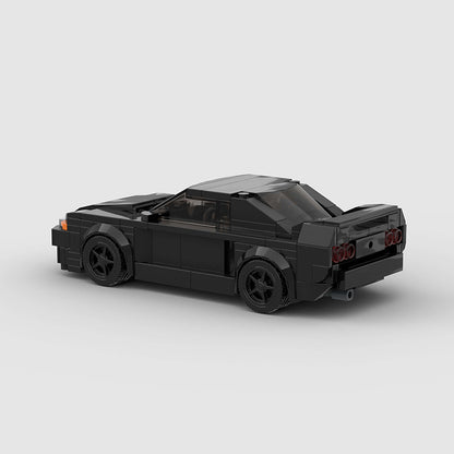 RevVblox Nissan Skyline GT-R R32 "Takeshi" model car from Initial D, detailed black and red sports car replica.