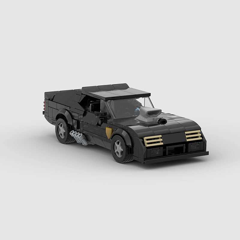 Revvblox 1973 Ford Falco V8 Interceptor model from Mad Max, detailed die-cast car showcasing rugged design and vintage style.