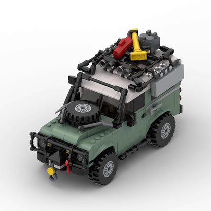 Green and white LEGO off-road vehicle with roof rack, spare tire, and tools on white background
